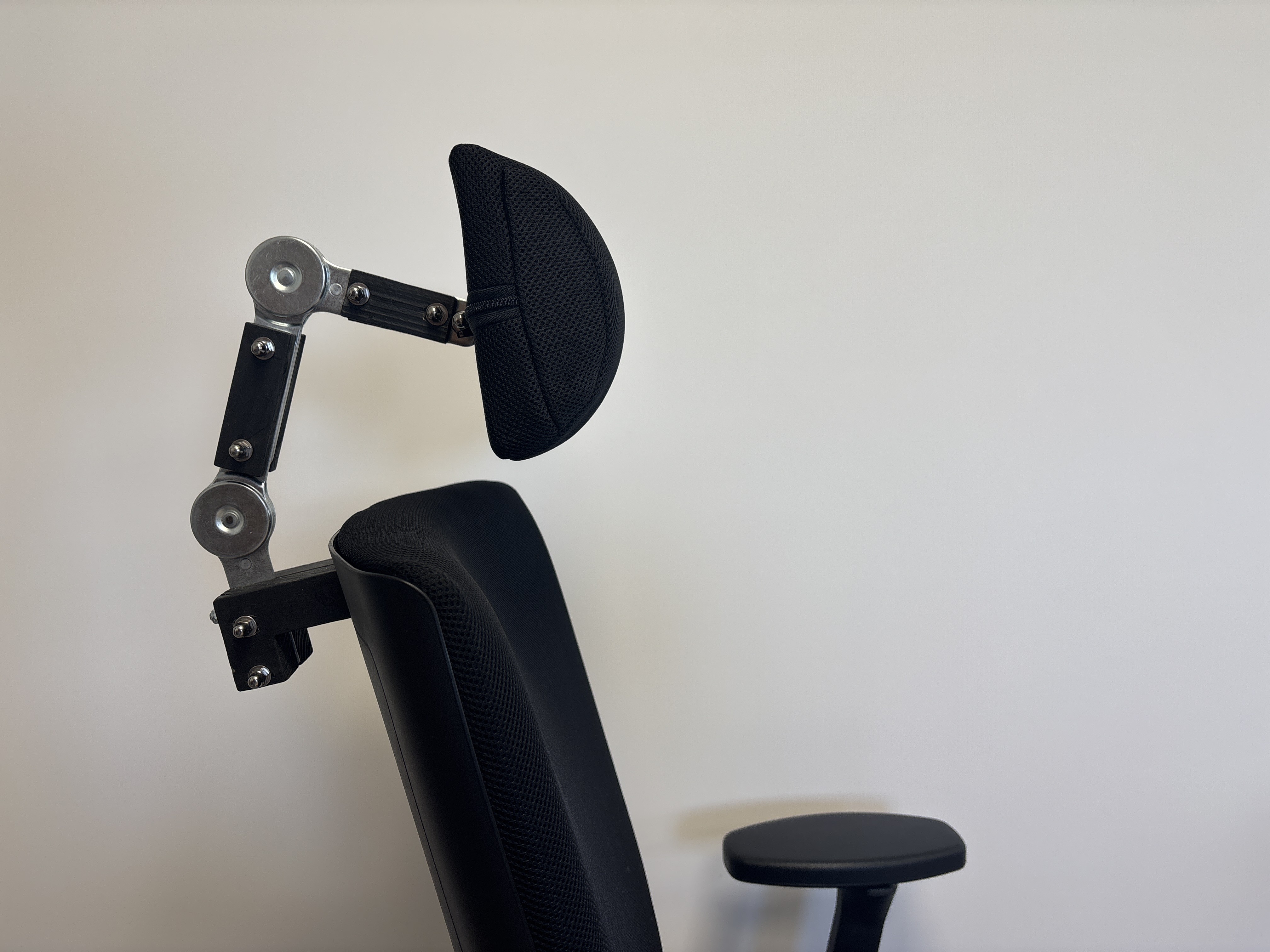 Appui-tête articulé pour fauteuil